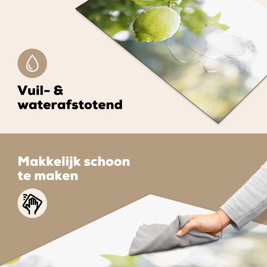 KitchenYeah® Inductie beschermer 80x52 cm - Close up of wet lime on branch - Kookplaataccessoires - Afdekplaat voor kookplaat - Inductiebeschermer - Inductiemat - Inductieplaat mat
