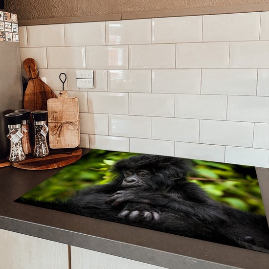 KitchenYeah® Inductie beschermer 76x51.5 cm - Close-up jonge gorilla - Kookplaataccessoires - Afdekplaat voor kookplaat - Inductiebeschermer - Inductiemat - Inductieplaat mat