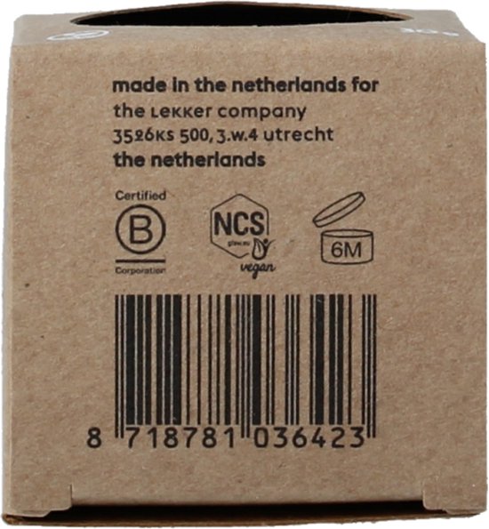 Kleine kartonnen doos met barcode en keurmerken.