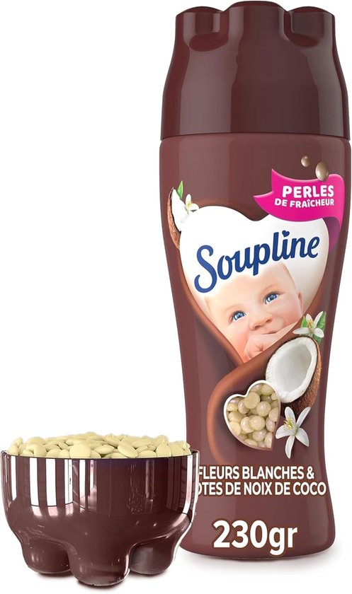 Perles d'adoucissant Soupline 'Fleurs Blanches & Noix de Coco'. Bouteille avec visage de bébé, logo cœur avec noix de coco et fleurs blanches. Coupelle de perles.