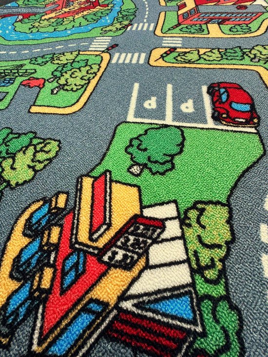 Speelkleed met een kleurrijke stad, wegen, huizen en bomen.