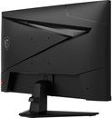 Zwarte MSI gaming monitor achterkant met drakenlogo en rode knop.