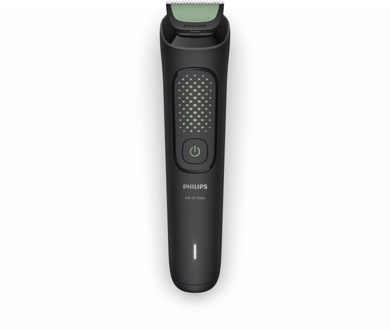 Zwarte Philips All-in-One trimmer met groen mesje, aan/uit-knop en indicatorlampje.