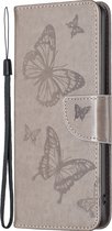 Mobigear Telefoonhoesje geschikt voor Xiaomi Redmi Note 11E Hoesje | Mobigear Butterfly Bookcase Portemonnee | Pasjeshouder voor 3 Pasjes | Telefoonhoesje voor Pinpas / OV Kaart / Rijbewijs - Grijs
