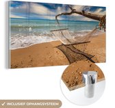 MuchoWow® Glasschilderij 120x60 cm - Schilderij acrylglas - Strand - Zee - Hangmat - Foto op glas - Schilderijen