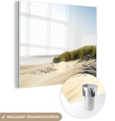 MuchoWow® Glasschilderij 50x50 cm - Schilderij acrylglas - Een heldere blauwe lucht boven duinen - Foto op glas - Schilderijen
