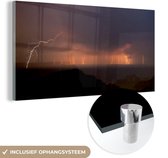 MuchoWow® Glasschilderij 160x80 cm - Schilderij acrylglas - Heftig onweer boven de Grand Canyon - Foto op glas - Schilderijen
