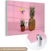MuchoWow® Glasschilderij - Pineapple watering a plant - 120x80 cm - Acrylglas Schilderijen - Foto op Glas