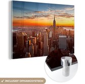 MuchoWow® Glasschilderij 120x80 cm - Schilderij acrylglas - Skyline - New York - Zon - Foto op glas - Schilderijen