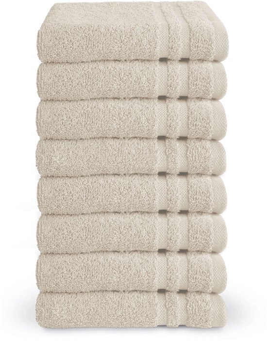 Stapel van 8 beige gastendoekjes, hotelkwaliteit, met gestreepte randafwerking.