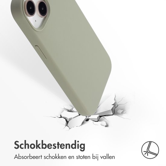 Groen telefoonhoesje dat valschade absorbeert, met gebroken steen eronder.
