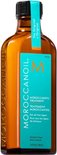 Amberkleurige fles met lichtblauwe label: Moroccanoil Treatment, 200ml.