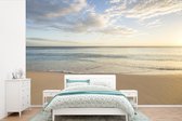 Behang - Fotobehang Strand - Water - Wolken - Breedte 600 cm x hoogte 400 cm