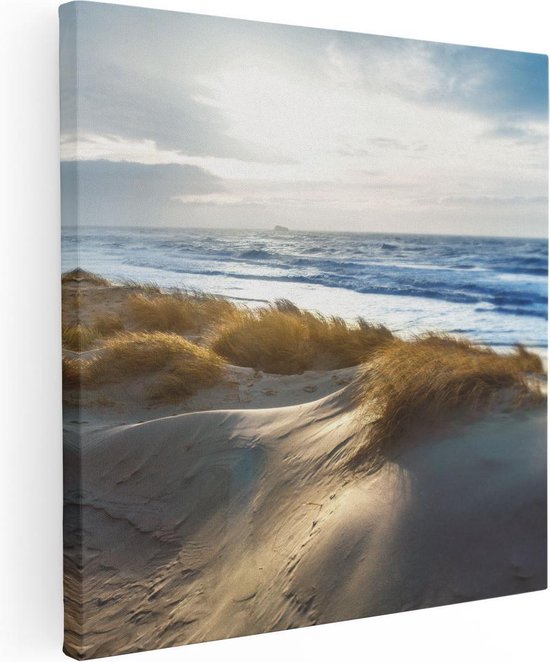 Impression sur toile de dunes et de mer, herbe dorée et ombres au coucher du soleil.