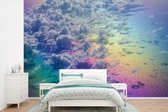Behang - Fotobehang Wolken met een regenboog - Breedte 330 cm x hoogte 220 cm
