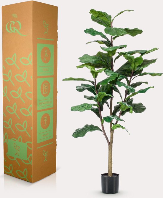 Plante artificielle ficus lyrata de 120 cm dans un pot noir à côté d'un grand emballage en carton avec des logos et pictogrammes verts.