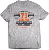 71 Jaar Legend - Feest kado T-Shirt Heren / Dames - Antraciet Grijs / Oranje - Perfect Verjaardag Cadeau Shirt - grappige Spreuken, Zinnen en Teksten. Maat XXL