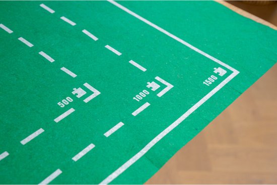 Groene puzzelmat met witte stippellijnen en markeringen voor 500, 1000, 1500 stukjes puzzels.