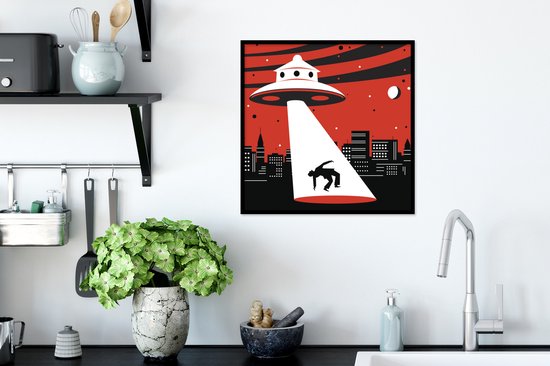 Image encadrée - Une illustration d'un OVNI qui enlève une personne Cadre photo noir 40x40 cm - Affiche encadrée (Décoration murale salon / chambre)