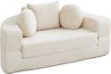 Tweezitsbank beige van ribfluweel met ronde en vierkante kussens.