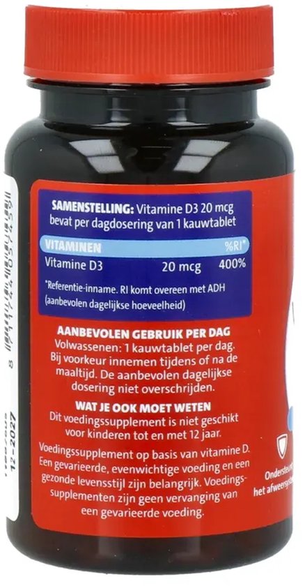 Zwart potje met rode dop en een rood etiket met Nederlandse tekst over samenstelling en gebruik.