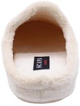 Binnenkant van de zachte, crèmekleurige pantoffel met zwart Scapa-label op de zool.