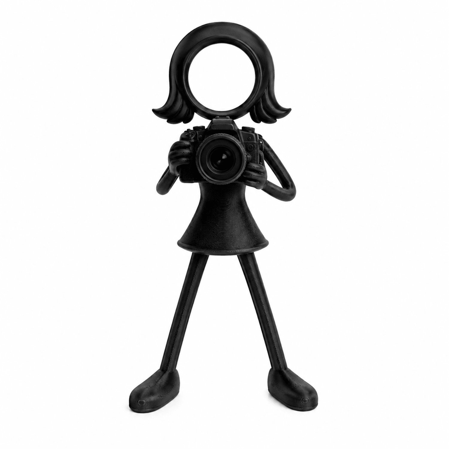 Stickyman Vrouwelijke Fotograaf - zwart - 20 cm hoog - zonder voetstuk