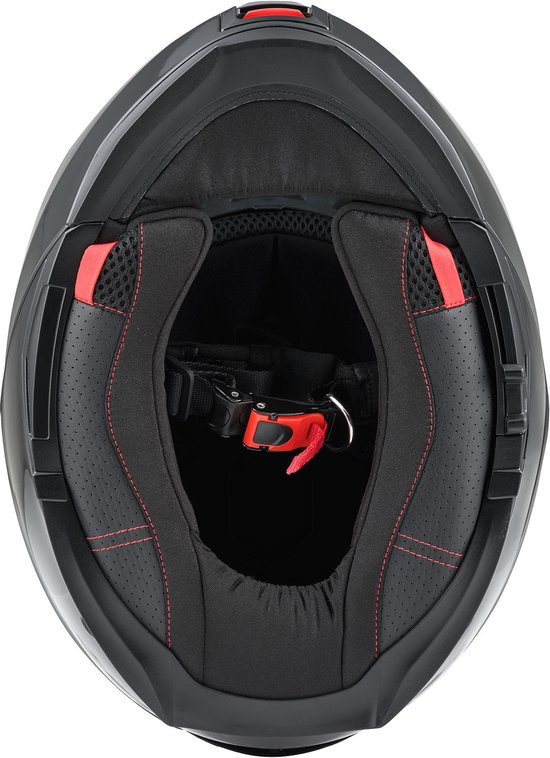 Binnenkant van de zwarte Bogotto helm met zwarte voering, rode stiksels en rode sluiting.