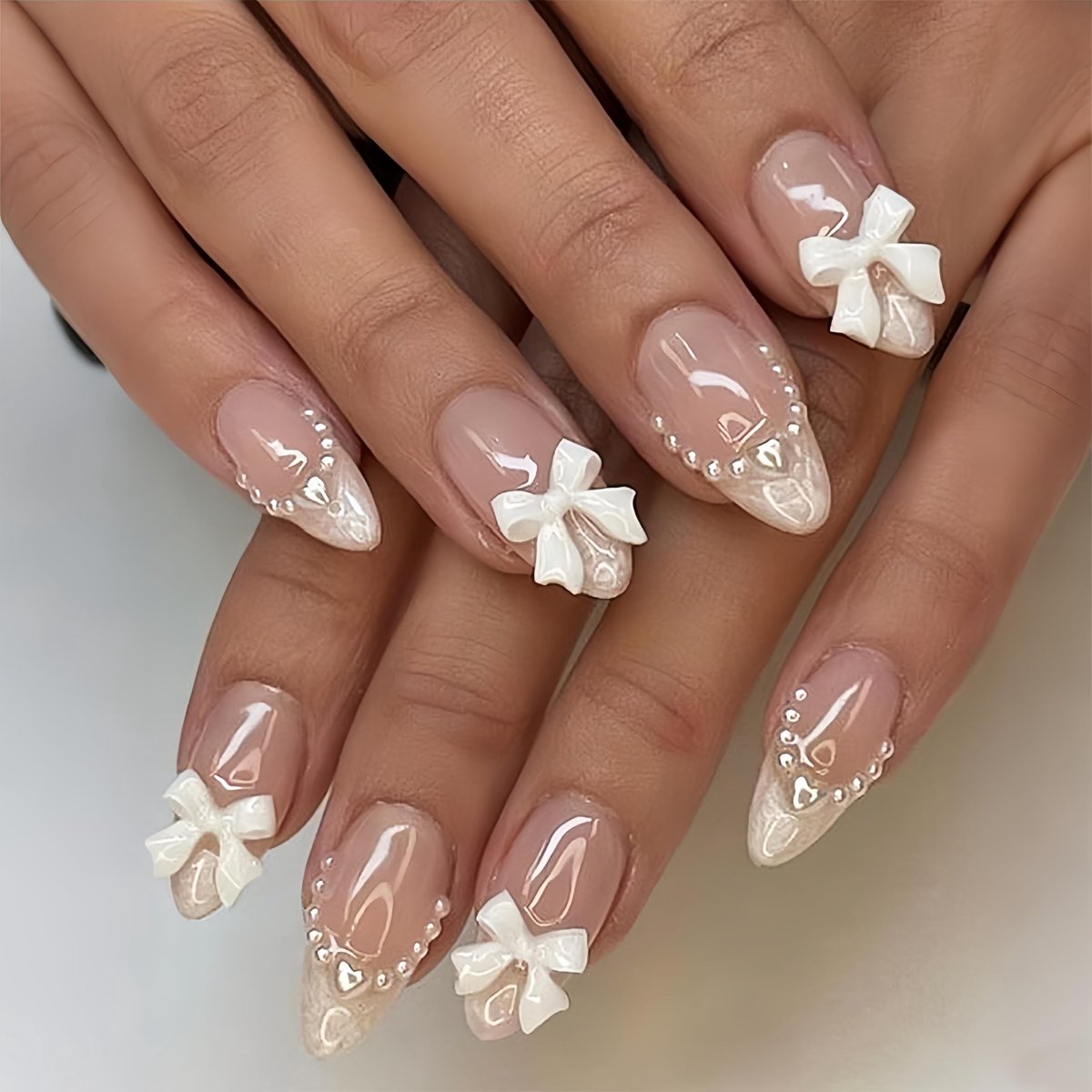 SolidKeus - Drukknoop Nagels met Franse Look en Strikontwerp