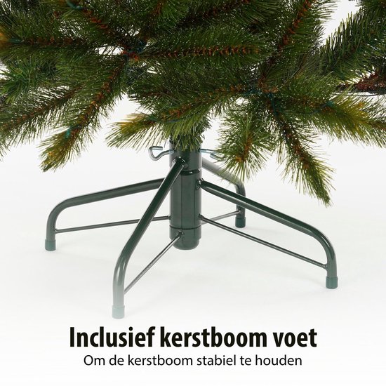 De groene kunstkerstboomvoet met de metalen standaard.