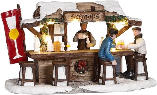 Miniature de kiosque à schnaps avec trois personnages au bar, sur fond d'arbres gelés.