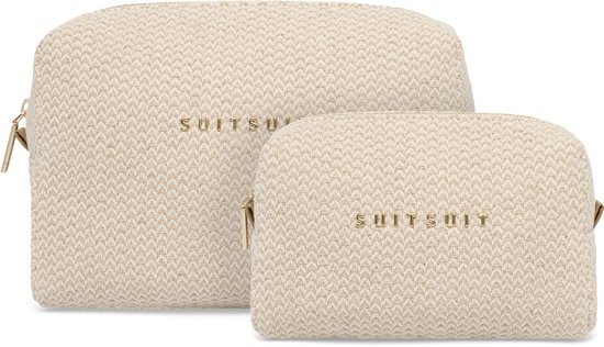 Twee off-white toilettassen met wafelpatroon en gouden SUITSUIT-opschrift.