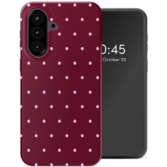 Coque de téléphone bordeaux à pois rose clair, à côté d'un smartphone affichant l'heure.