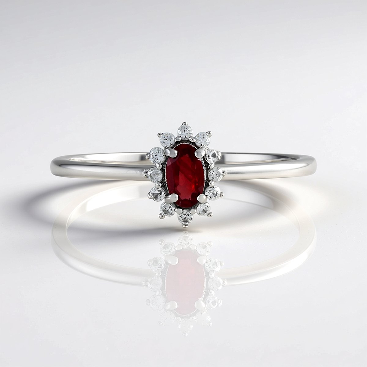 Cavill - Zilveren Ring - 925 Sterling Zilver met Platina Afwerking - 0,236 ct Tanzaniaanse Ovale Robijn & 12 Briljantgeslepen Zirkonen