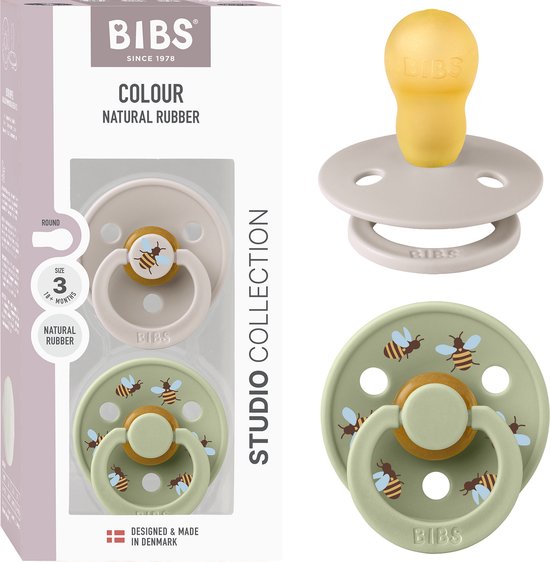 BIBS Colour Studio verpakking met twee spenen: één grijze en één lichtgroene met bijenprint. Maat 3 (18+ maanden).