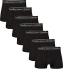 Zeven zwarte bamboe boxershorts op een rij, met een elastische band met 'Bamboo Basics' logo.