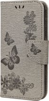 Apple iPhone 12 Hoesje - Mobigear - Butterfly Serie - Kunstlederen Bookcase - Grijs - Hoesje Geschikt Voor Apple iPhone 12