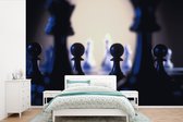 Behang - Fotobehang De zwarte pionnen van het schaken - Breedte 360 cm x hoogte 240 cm