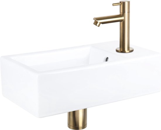 Lavabo rectangulaire blanc avec robinet en laiton.