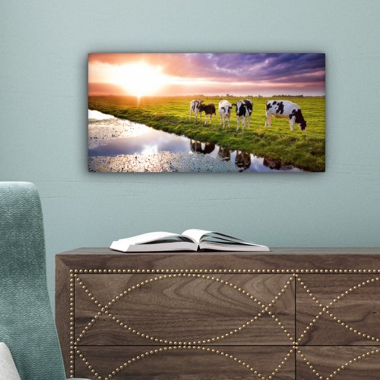 Tableau sur toile Vaches pendant un coucher de soleil - 40x20 cm - Décoration murale Art