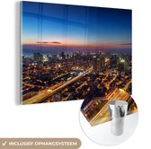 MuchoWow® Glasschilderij 90x60 cm - Schilderij acrylglas - Skyline van Manila tijdens schemering - Foto op glas - Schilderijen