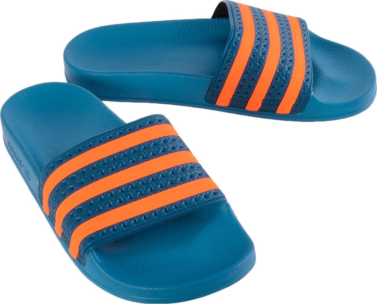 adidas Adilette - Slippers - Mannen - Maat 46 - Donkerblauw/Oranje | bol