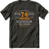 74 Jaar Legend T-Shirt | Goud - Zilver | Grappig Verjaardag Cadeau | Dames - Heren | - Donker Grijs - M