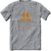44 Jaar Legend T-Shirt | Goud - Zilver | Grappig Verjaardag Cadeau | Dames - Heren | - Donker Grijs - Gemaleerd - XXL