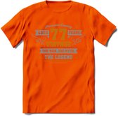 77 Jaar Legend T-Shirt | Goud - Zilver | Grappig Verjaardag Cadeau | Dames - Heren | - Oranje - L