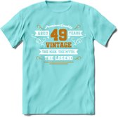 49 Jaar Legend T-Shirt | Goud - Wit | Grappig Verjaardag en Feest Cadeau Shirt | Dames - Heren - Unisex | Tshirt Kleding Kado | - Licht Blauw - XL