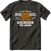 29 Jaar Legend T-Shirt | Goud - Wit | Grappig Verjaardag en Feest Cadeau Shirt | Dames - Heren - Unisex | Tshirt Kleding Kado | - Donker Grijs - M