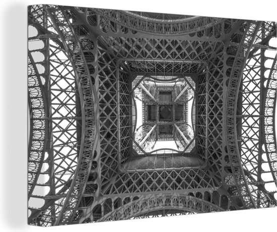 Canvas Schilderij Onderaanzicht van de Eiffeltoren in Parijs - zwart wit - Wanddecoratie
