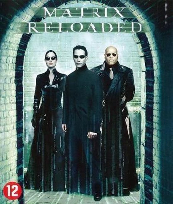 De cover van "The Matrix Reloaded" toont Trinity, Neo en Morpheus in lange zwarte kleding, staand in een tunnel.