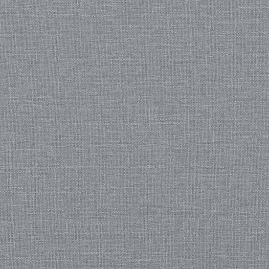 Tissu gris avec une texture visible de fils tissés.